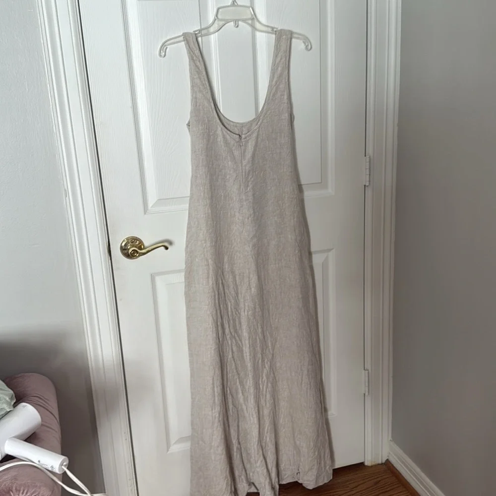 NWOT Reformation tan jumpsuit size small fits oversized